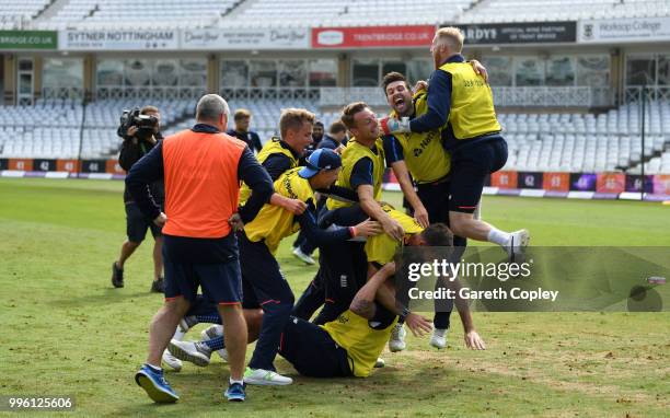 Sam Curran, Mark Wood, Jos Buttler, Jason Roy and Liam Plunkett of England celebrate winning a pre nets session football match at Trent Bridge on...