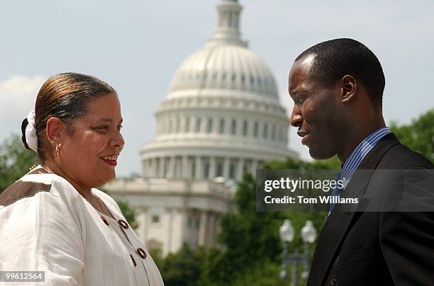 Dwayne Bolton of the Black Republican Congressional Staff Association , talks with Virginia Walden-Ford of DC Parents for School Choice, after a news...
