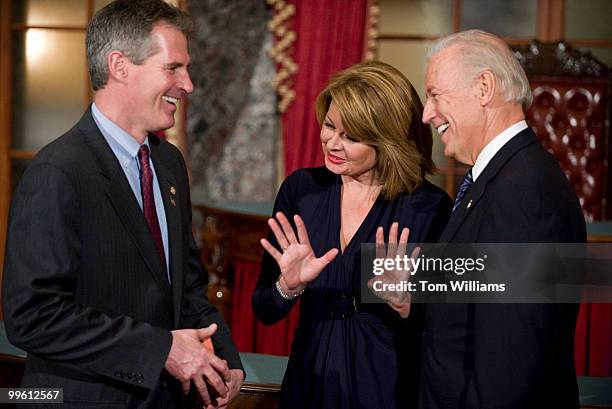 Sen. Scott Brown, R-Mass., participates in a ceremonial swearing in with his wife Gail Huff and Vice President Joe Biden in the Old Senate Chamber,...