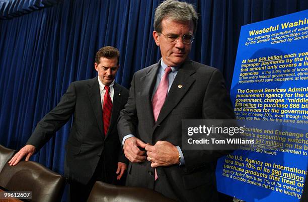 Sens. Tom Coburn, R-Okla., right, and Jim DeMint, R-S.C., leave a news conference with other republican Senators on how to find budgets cuts and...