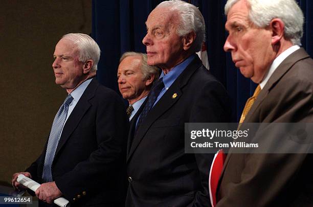 From left, Sen. John McCain, R-Ariz., Sen. Joe Lieberman, D-Conn., Reps. Tom Lantos, D-Calif., and Frank Wolf, R-Va., wrap up a news conference...