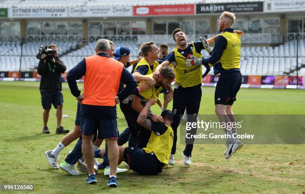 Sam Curran, Mark Wood, Jos Buttler, Jason Roy and Liam Plunkett of England celebrate winning a pre nets session football match at Trent Bridge on...