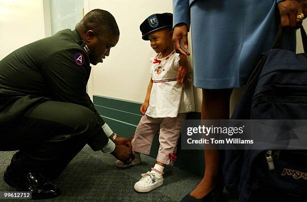 Capt. David Hartwell and daughter Janelle prepare to speak at a news conference with Sen. Lamar Alexander, R-Tenn., announcing a program, Operation...