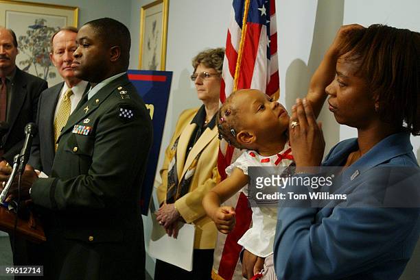 Capt. David Hartwell, speaks at a news conference with Sen. Lamar Alexander, R-Tenn., announcing a program, Operation Child Care, that would provide...