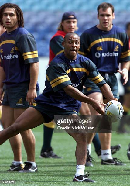 George Gregan of Australia throws a pass during a training session before the Tri Nations last Test against the All Blacks at Studium Australia in...