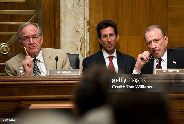 Sen. Tom Harkin, D-Iowa, left, and Arlen Specter, R-Pa., listen to testimony during a Senate Appropriations Committee Labor, HHS, Education and...