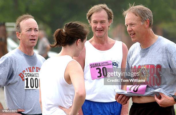 From left, OMB Director, Mitch Daniels, Amy Call of OMB, Sens. Lincoln Chafee, R-R.I., and Don Nickles, R-Okla., talk after the finish of the Capital...