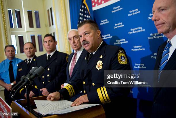 Chief Dennis Rubin, D.C. Fire and EMS, speak at a news conference with Sens. Joe Lieberman, I-Conn., right, Frank Lautenberg, D-N.J., and other first...