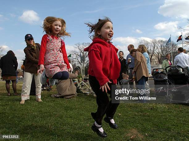 Lyla Ward left, and and Emma Jenks jump rope while waitng for a parade of elephants from the Ringling Brothers Barnum and Bailey Circus, along...