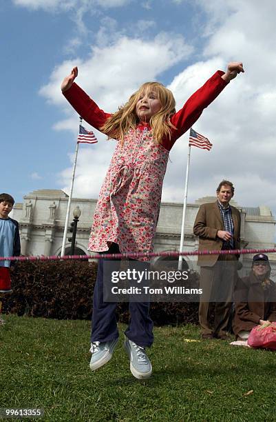 Lyla Ward jumps rope while waitng for a parade of elephants from the Ringling Brothers Barnum and Bailey Circus, along Columbus Circle, near Union...