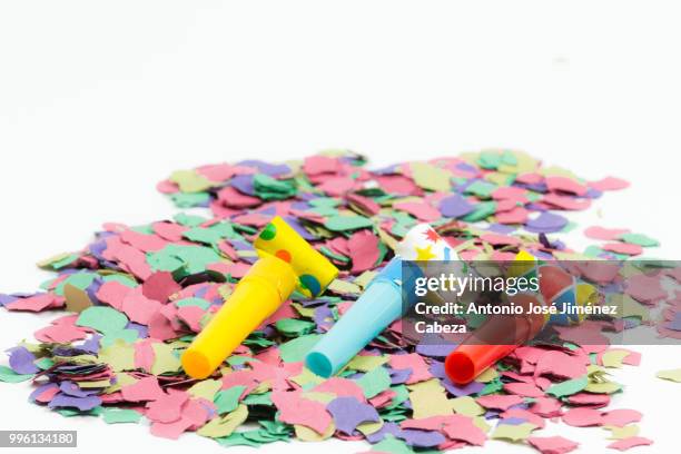 confetti and party blower - party blower stock-fotos und bilder