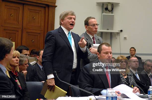 Rusty Hardin, left, and Lanny Brewer, stand to defend their client Roger Clemens, former MLB pitcher, during a House Oversight and Government Reform...
