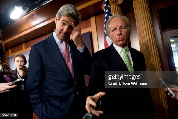 From left, Sens. John Kerry, D-Mass., and Joe Lieberman, I-Conn., wrap up a news conference on climate change, Dec. 10, 2009. Sen. Lindsey Graham,...