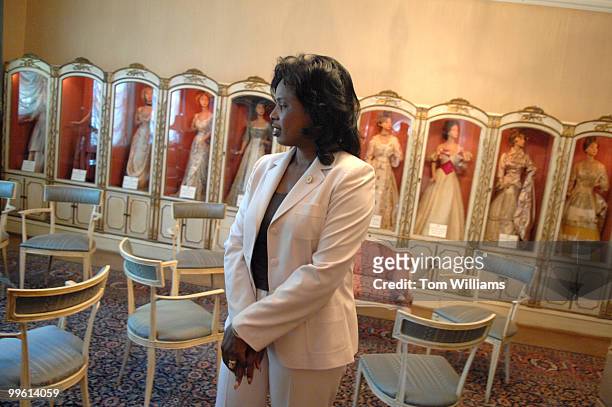 Vivian Bishop views dolls depicting First Ladies on display at Congressional Club, an organization thats members are Congressional spouses. She is...