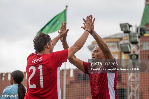 Nuno Gomes celebrates with Cafu during the Legends Football Match in Red Square on July 11, 2018 in Moscow, Russia.