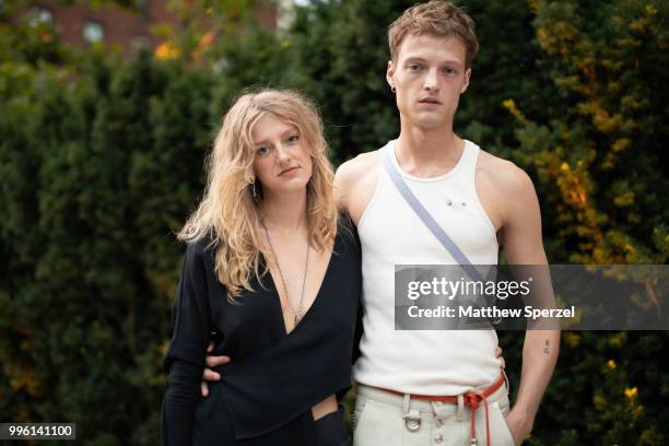Dane Bell are Pilar Garrett seen on the street attending Men's New York Fashion Week wearing Linder on July 10, 2018 in New York City.
