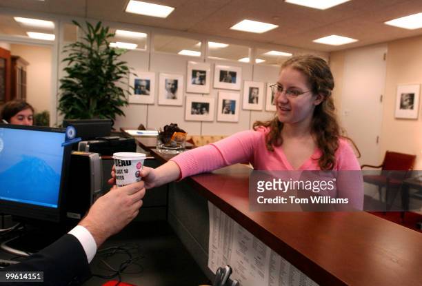 Amy Katzel, a George Washington University sophmore, delivers coffee to the Hart Building office of Senate Majority Leader Bill Frist, R-Tenn., to...