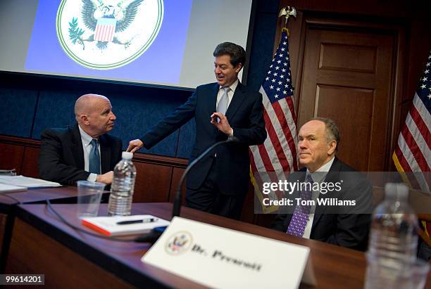 Rep. Kevin Brady, R-Texas, left, Sen. Sam Brownback, R-Kan., center, and Edward Prescott, winner of the Nobel Prize in Economics, talk before the...