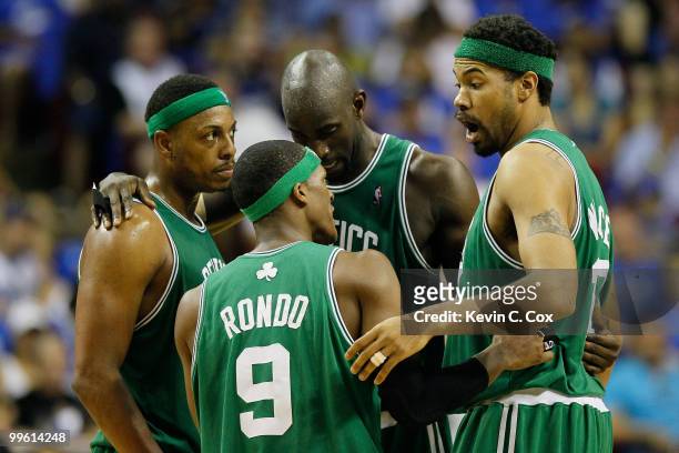 Paul Pierce, Rajon Rondo, Kevin Garnett and Rasheed Wallace of the Boston Celtics huddle up against the Orlando Magic in Game One of the Eastern...