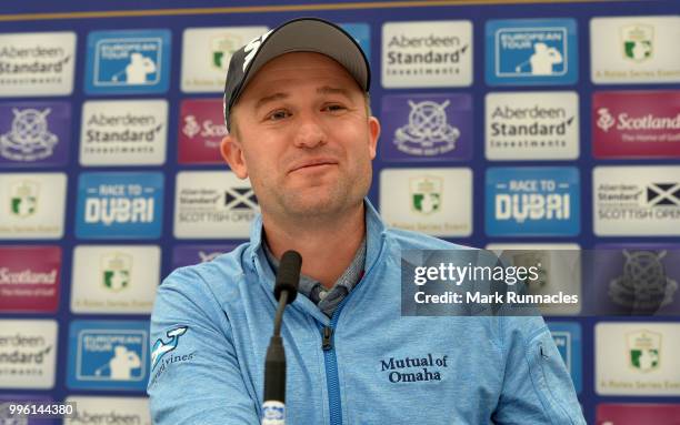 Russell Knox of Scotland speaks to the media during previews for the Aberdeen Standard Investments Scottish Open at Gullane Golf Course on July 11,...