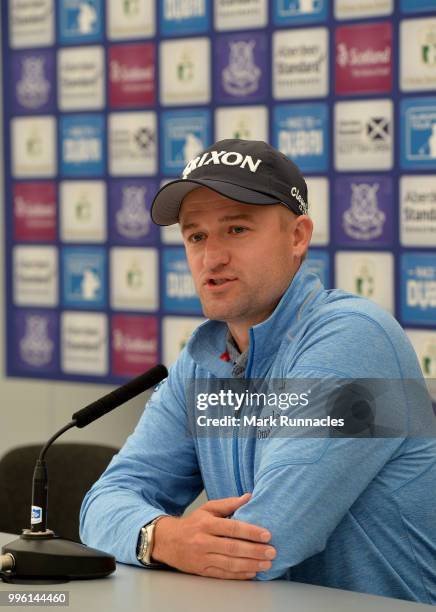 Russell Knox of Scotland speaks to the media during previews for the Aberdeen Standard Investments Scottish Open at Gullane Golf Course on July 11,...