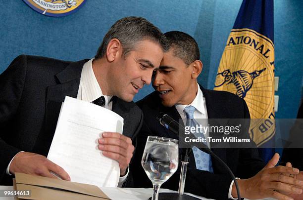 Sen. Barack Obama, D-Ill., left, has a word with actor George Clooney at the National Press Club for "SAVE DARFUR: Rally to Stop Genocide." Clooney...