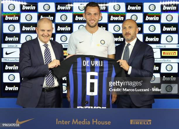 Chief Football Administrator of FC Internazionale Milano Giovanni Gardini, FC Internazionale new signing Stefan De Vrij and Sportif Director of FC...