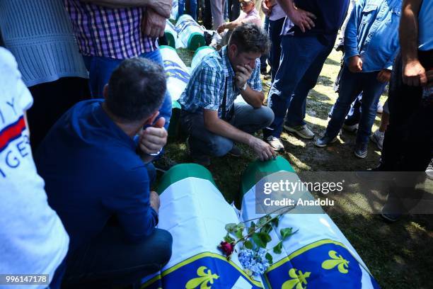 Relative of Srebrenica victims mourn while burial ceremony of newly identified 35 victims during the 23rd anniversary of the 1995 Srebrenica massacre...