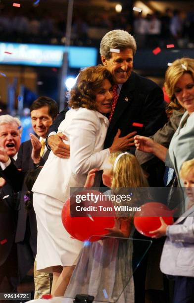 Sen. John Kerry, D-Mass., hugs his wife Teresa on the night he was nominated as the presidential candidate, at Democratic National Convention 2004,...