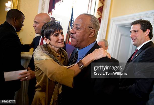 Rep. Rosa DeLauro, D-Conn., hugs Rev. Carlton Veazey, President and CEO of the Religious Coalition for Reproductive Choice, after a news conference...