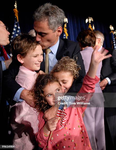 Rep. Rahm Emanuel, D-Ill., hugs his kids from left, Zach Leah and Ilana and Zach at the DCCC party at the Hyatt Regency on New Jersey Ave.