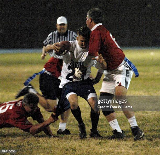 Jim Davis of the Capitol Police is stopped during the 3rd Biennial Longest Yard Fall Classic played at Eastern High School in Northeast. The U.S....