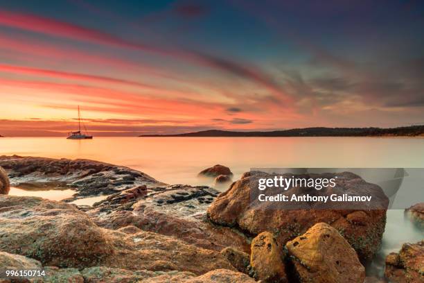 coles bay sunset - coles stock pictures, royalty-free photos & images