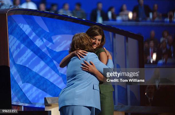 Daughter Cate Edwards hugs mom Elizabeth on the night their dad and husband, Sen. John Edwards, D-N.C., was nominated as the vice presidential...
