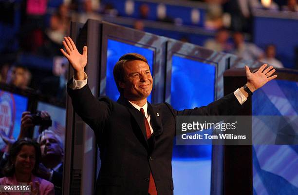 Sen. John Edwards, D-N.C., waves to the crowd after speaking to the delegation on the night he was nominated as the vice presidential candidate, at...
