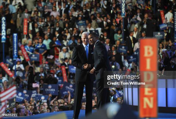 Sen. Joe Biden, D-Del., left, greets presidential candidate Barack Obama on the third day of the Democratic National Convention in Denver when Biden...