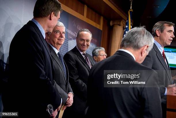 From left, Sen. Mark Warner, D-Va., Chris Dodd, D-Conn., Charles Schumer, D-N.Y., Daniel Akaka, D-Hawaii, Jack Reed, D-R.I., and Jeff Merkley,...