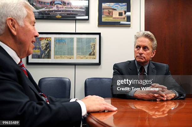 Actor and producer Michael Douglas, right, meets with Sen. Dick Lugar, R-Ind., on non-proliferation issues, May 21, 2008.