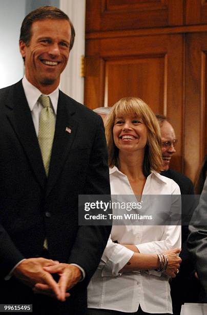 Sen. John Thune, D-S.D., and Rep. Stephanie Herseth, D-S.D., share laugh at a news conference highlighting the need for disaster assistance for...