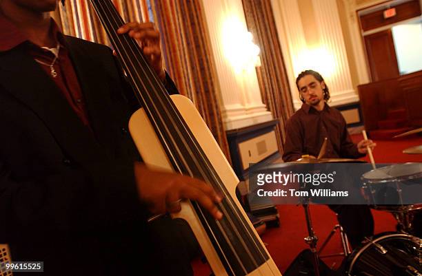 Benjiman Williams on bass and Michael DeCastro on drums perform during "Sounds of the Season" in the Cannon Caucus Room. Kids from Duke Eliington...