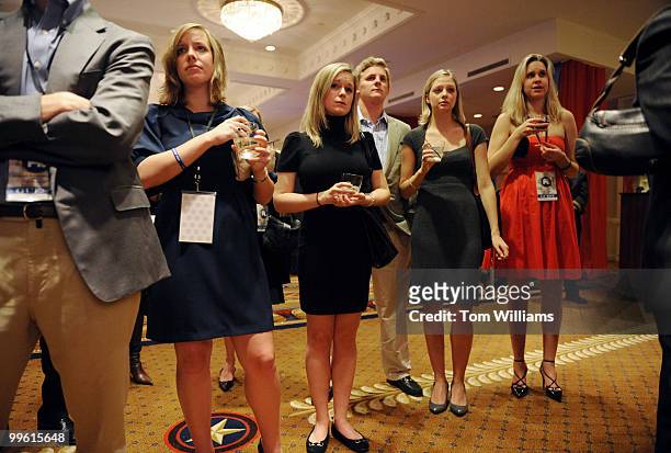 Attendees of the RNC party held at the Capitol Hilton at 16th and K Streets, NW, watch John McCain concede the presidency to Barack Obama, on...