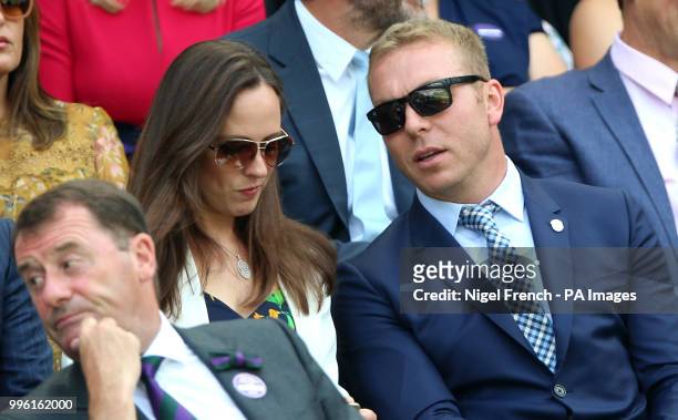 Sir Chris Hoy and Lady Sarra Hoy in the royal box on centre court on day nine of the Wimbledon Championships at the All England Lawn Tennis and...