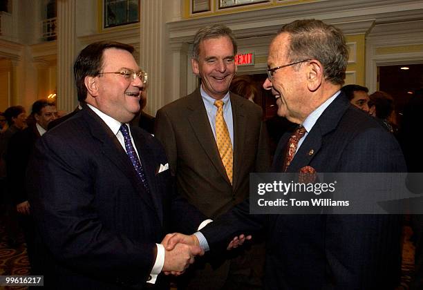 Eddie Fritts, left, greets Sen. Ted Stevens, R-Alaska, right, and Sen. Judd Gregg, R-N.H., at Fritts' retirement party held at the Willard Hotel,...