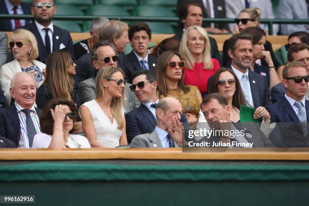 Rory McIlroy and Erica Stoll attend day nine of the Wimbledon Lawn Tennis Championships at All England Lawn Tennis and Croquet Club on July 11, 2018...