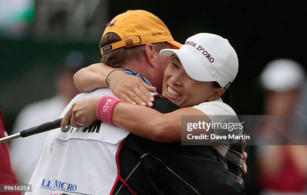 Se Ri Pak of South Korea hugs her caddie in the Bell Micro LPGA Classic at the Magnolia Grove Golf Course on May 16, 2010 in Mobile, Alabama. Pak...