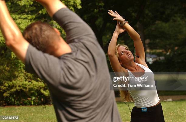Madeline Dolente, international fitness expert, conducts a stretching seminar at the 2nd annual WalkingWorks Capitol Hill Challenge, near Russell...