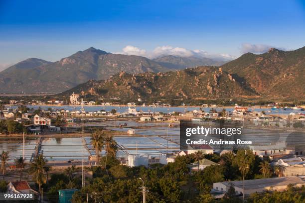 artificial small lake for the production of salt, on the outskirts of phan rang in the mountainous hinterland of ninh thuan, vietnam - phan rang stock pictures, royalty-free photos & images