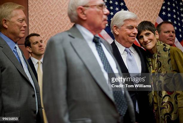 Rep. Rosa DeLauro, D-Conn., hugs Sen. Chris Dodd, D-Conn., during an event to held by Building America's Future to announce their support for the...