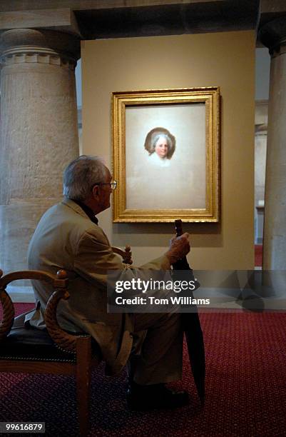 Man views a portrait of Martha Washington in the Smithsonian American Art Museum and National Portrait Gallery. The two museums are collectively...