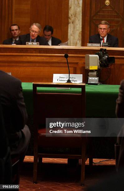 At a hearing of Democratic Policy Committee , the chair of James Mulva, CEO of Conoco Phillips sits empty during a hearing to examine the causes and...